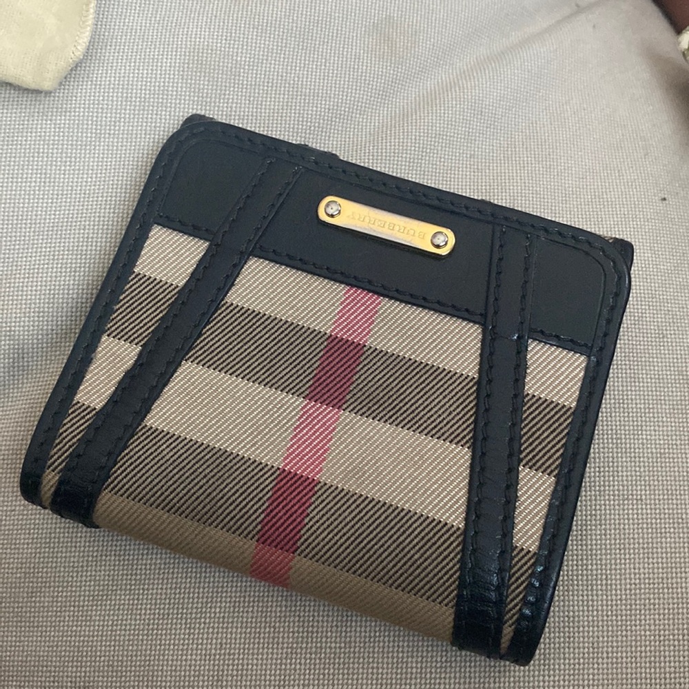 Authentic Burberry trifold check pattern wallet.